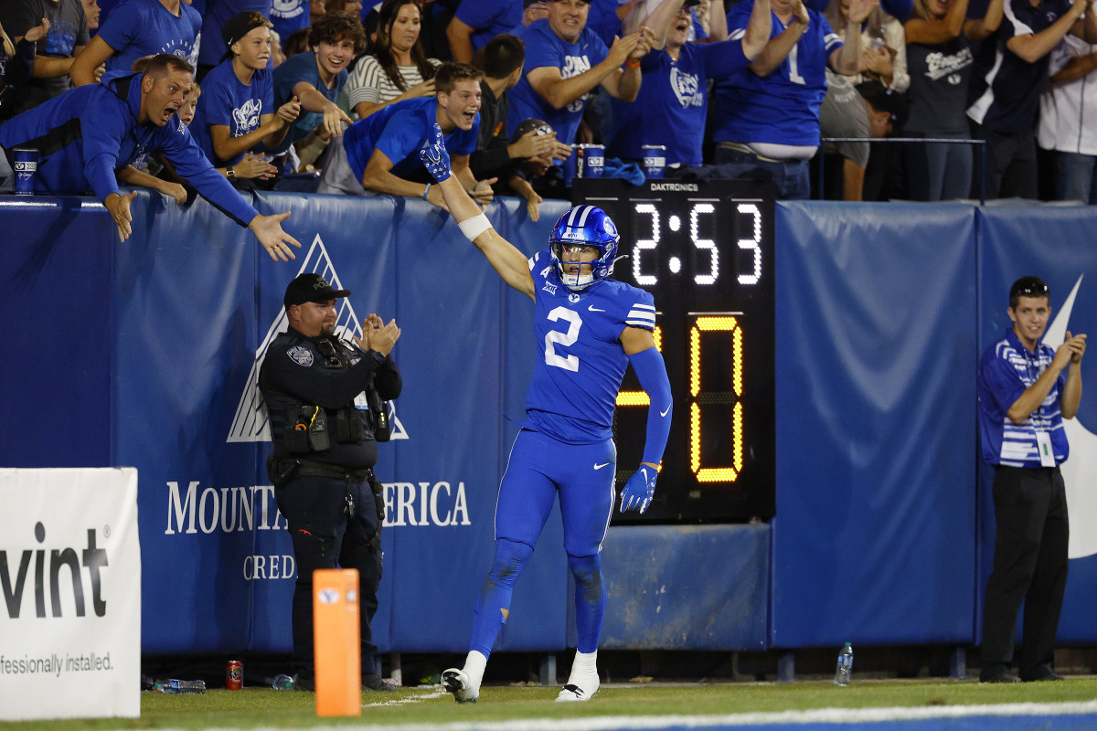 Sep 29, 2023; Provo, Utah, USA; Brigham Young Cougars wide receiver Chase Roberts (2) reacts after a second-half touchdown at LaVell Edwards Stadium. Mandatory Credit: Jeff Swinger-USA TODAY Sports
