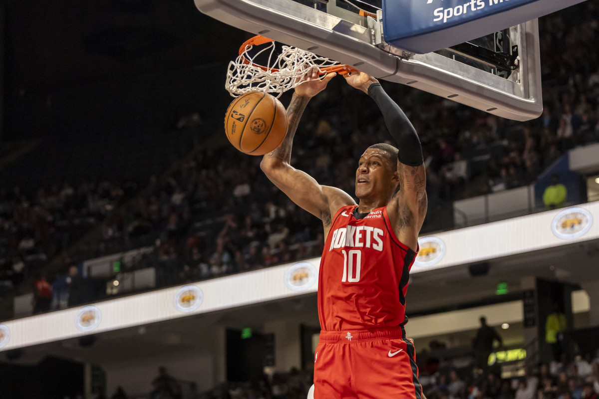 Houston Rockets forward Jabari Smith Jr. (10) dunks for two against the New Orleans Pelicans during an NBA exhibition game at Legacy Arena at BJCC.
