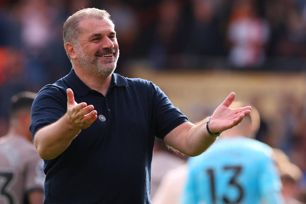 Tottenham Hotspur manager Ange Postecoglou pictured celebrating in front of his team's fans after a 1-0 win at Luton Town in October 2023