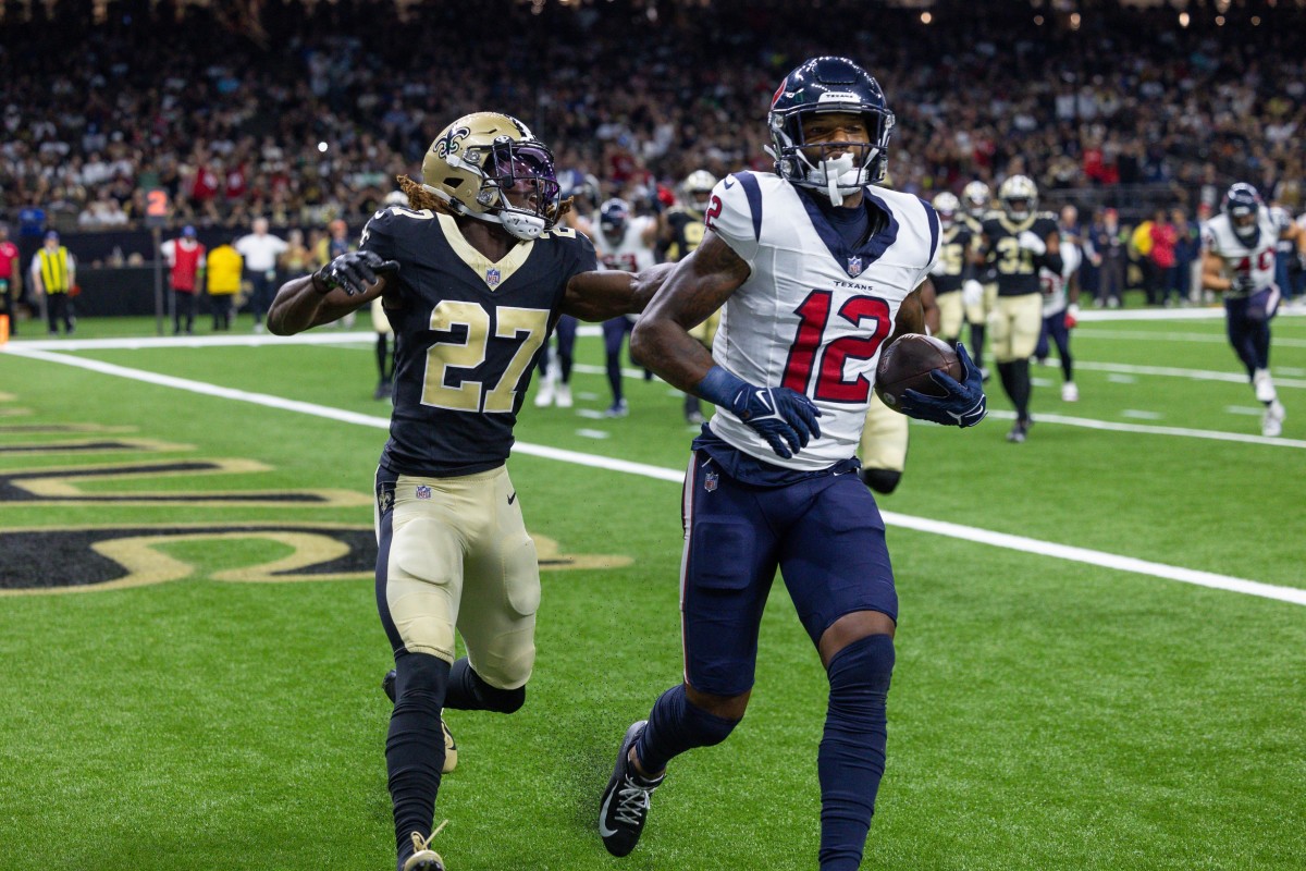 Aug 27, 2023; Houston Texans wide receiver Nico Collins (12) makes a catch for a touchdown against the New Orleans Saints. Mandatory Credit: Stephen Lew-USA TODAY Sports