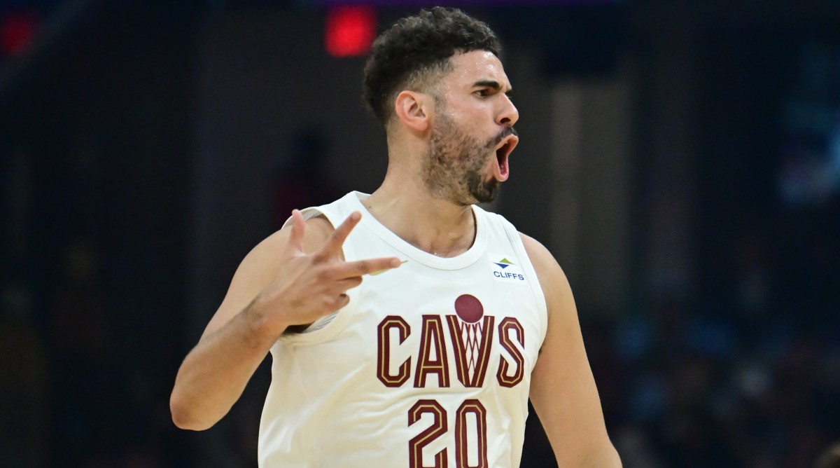 Cavaliers forward Georges Niang (20) celebrates after hitting a three-pointer during the first half of a preseason game against the Magic.