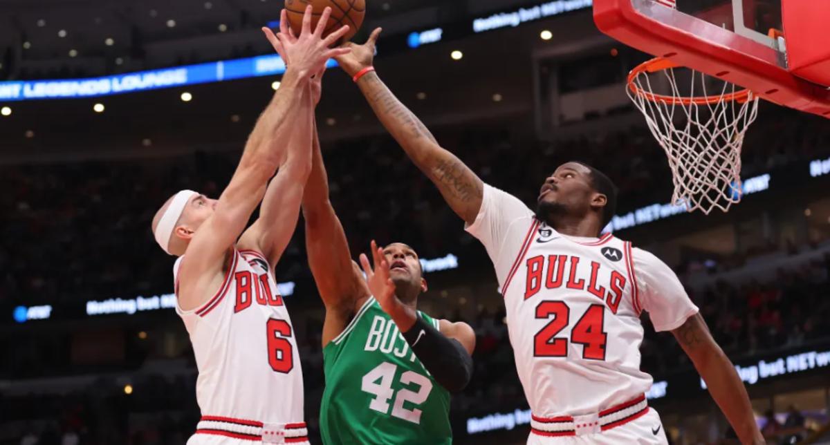 Green (24) blocks Al Horford's shot during a game between Chicago and Boston last season