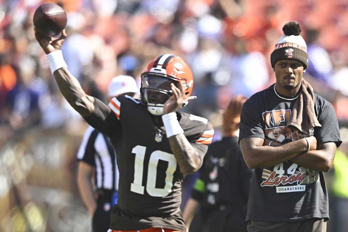 Oct 1, 2023; Cleveland, Ohio, USA; Cleveland Browns quarterback Deshaun Watson (right) watches quarterback PJ Walker (10) warm up before a game against the Baltimore Ravens at Cleveland Browns Stadium. Mandatory Credit: David Richard-USA TODAY Sports
