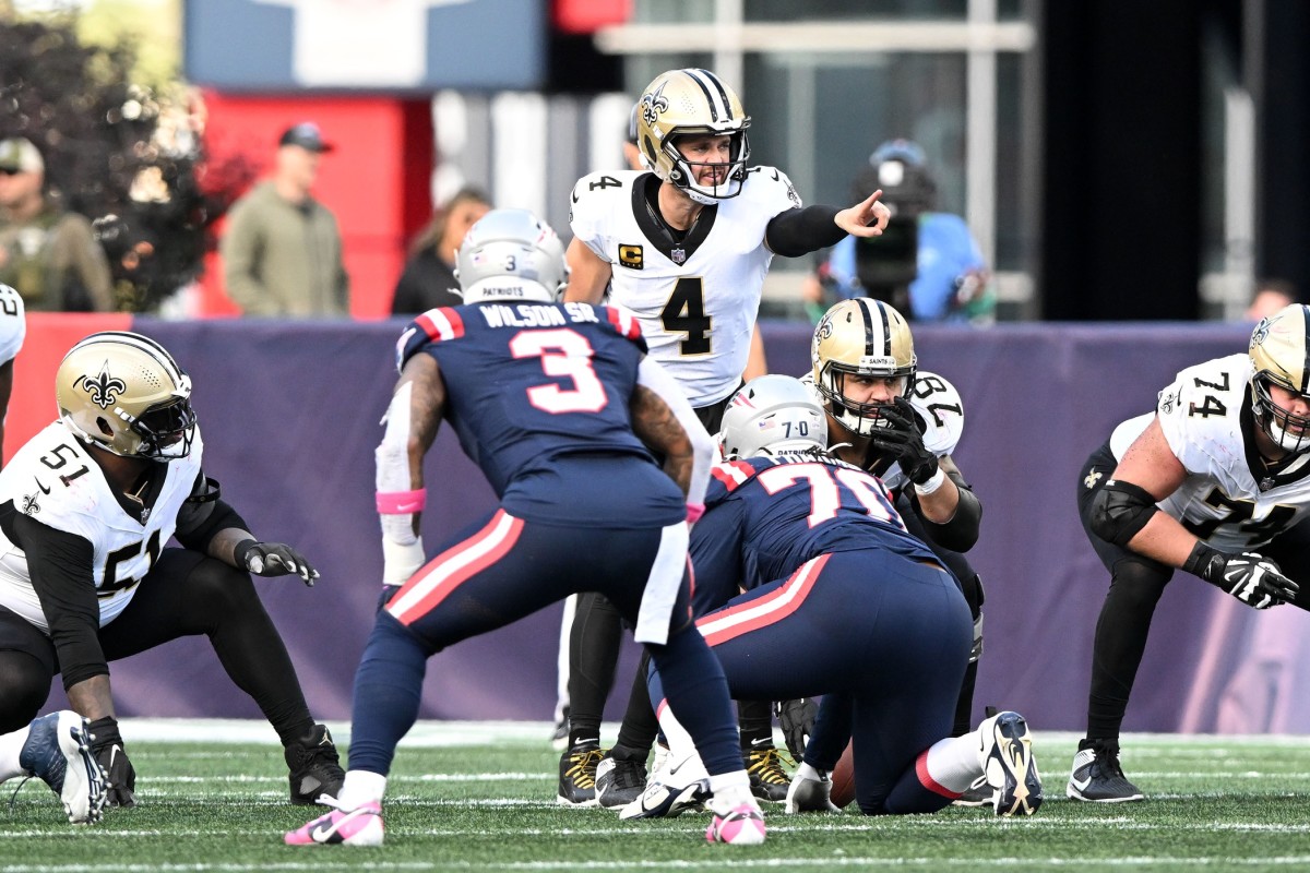 New Orleans Saints quarterback Derek Carr (4) calls a play against the New England Patriots. Mandatory Credit: Brian Fluharty-USA TODAY Sports