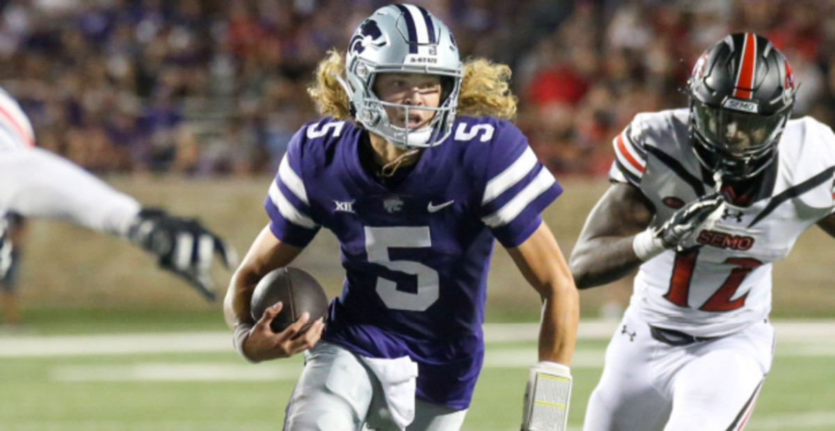 Kansas State Wildcats quarterback Avery Johnson on a rushing attempt during a college football game in the Big 12.