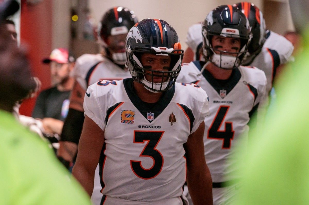 Denver Broncos quarterback Russell Wilson (3) leads the team to the field for the game against the Kansas City Chiefs at GEHA Field at Arrowhead Stadium.