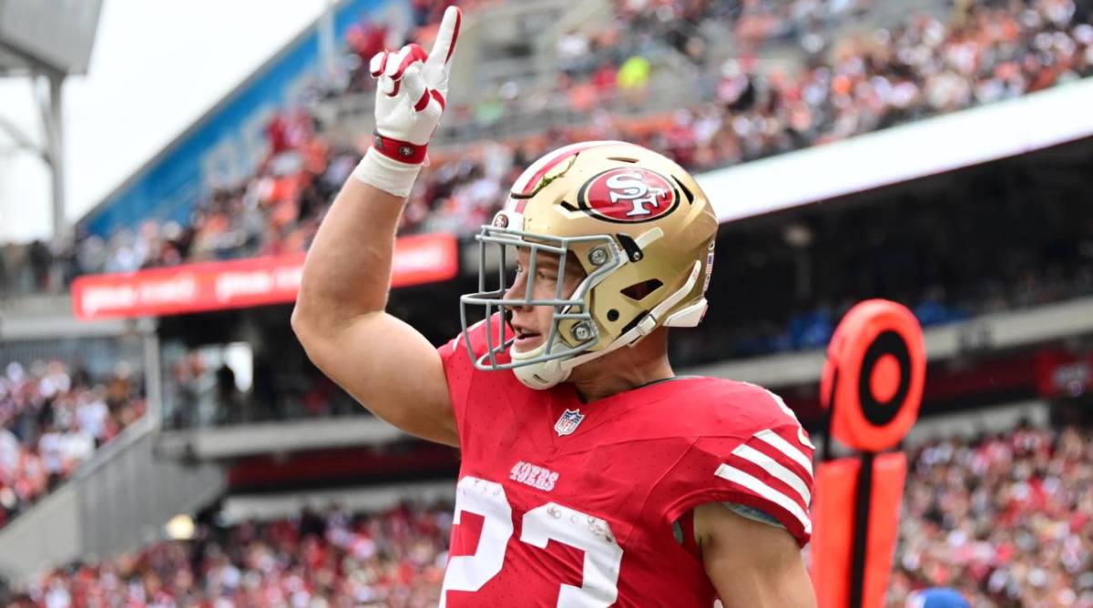 Christian McCaffrey celebrates after a touchdown against the Cleveland Browns.