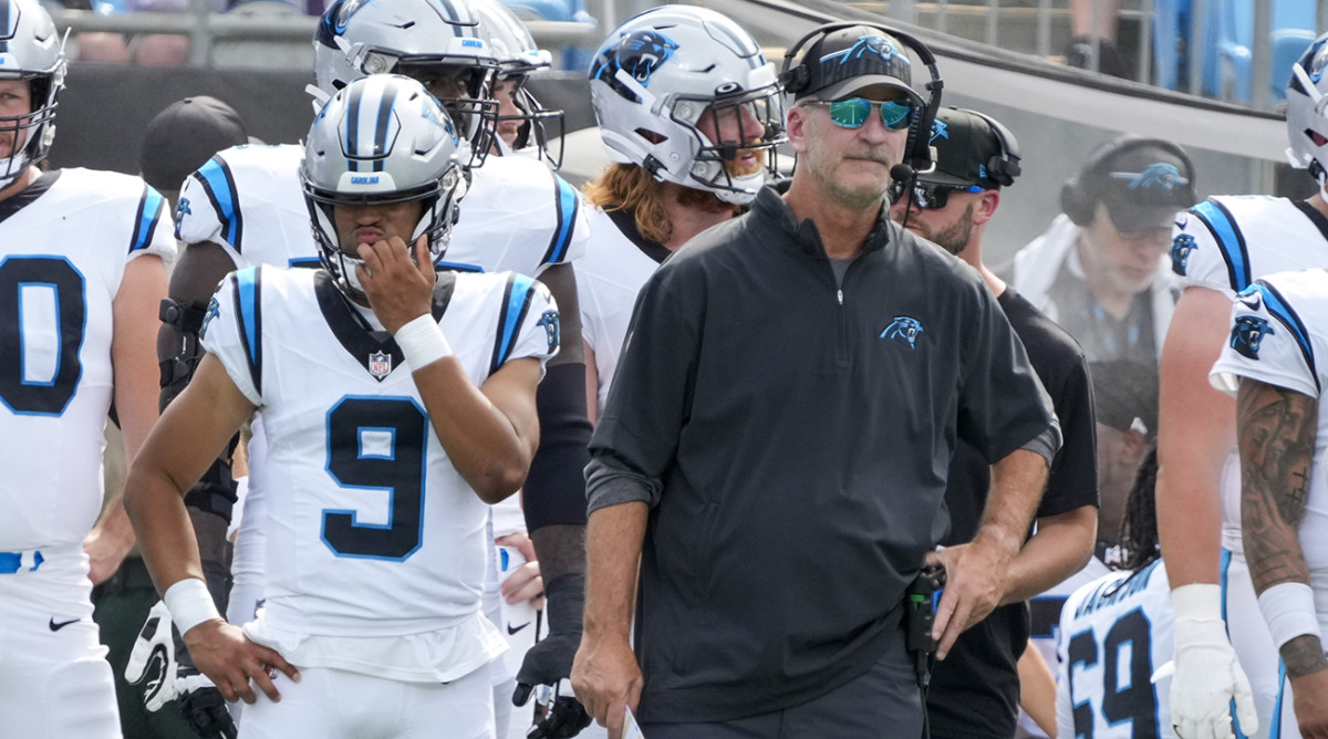 Panthers coach Frank Reich stands on the sideline with quarterback Bryce Young (9) during the first quarter against the Jets at Bank of America Stadium.