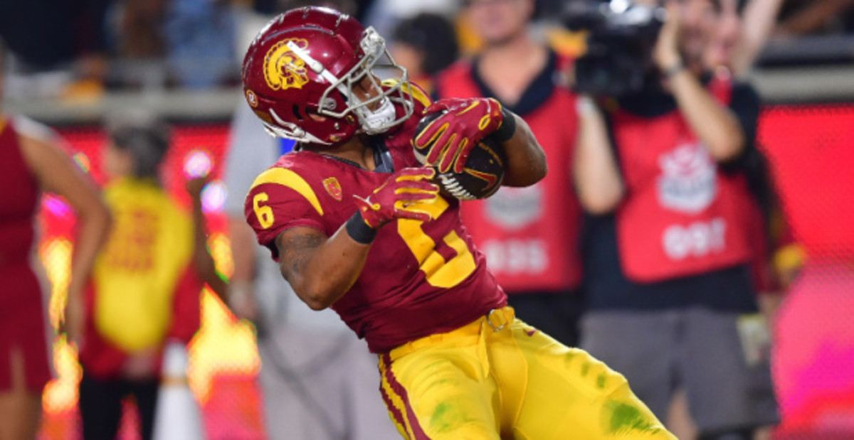 USC Trojans running back Austin Jones celebrates a touchdown during a college football game.