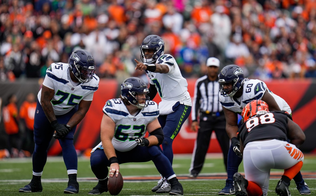 Seattle Seahawks quarterback Geno Smith (7) calls out the defense a the line of scrimmage in the third quarter of the NFL Week 6 game between the Cincinnati Bengals and the Seattle Seahawks at Paycor Stadium in downtown Cincinnati on Sunday, Oct. 15, 2023
