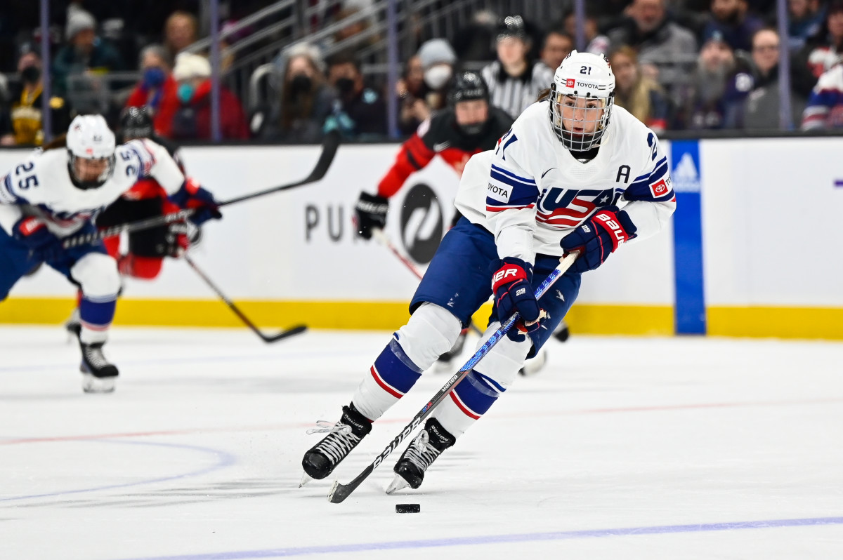 Nov 20, 2022; Seattle, Washington, USA; USA forward Hilary Knight (21) advances the puck against Canada during the third period at Climate Pledge Arena. USA defeated Canada 4-2. Mandatory Credit: Steven Bisig-USA TODAY Sports