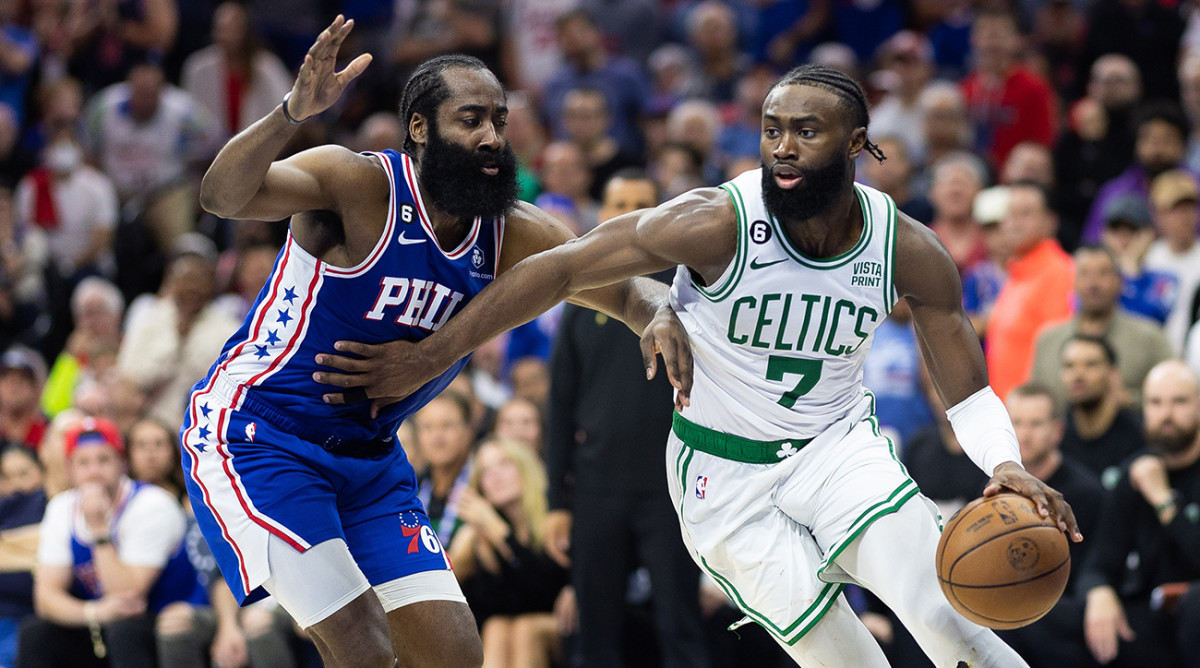 Celtics’ Jaylen Brown drives past 76ers’ James Harden in the NBA playoffs.