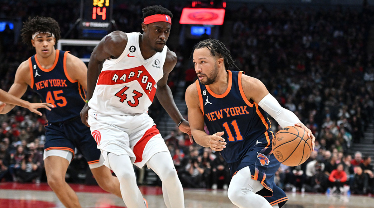 Raptors’ Pascal Siakam defends Knicks’ Jalen Brunson.