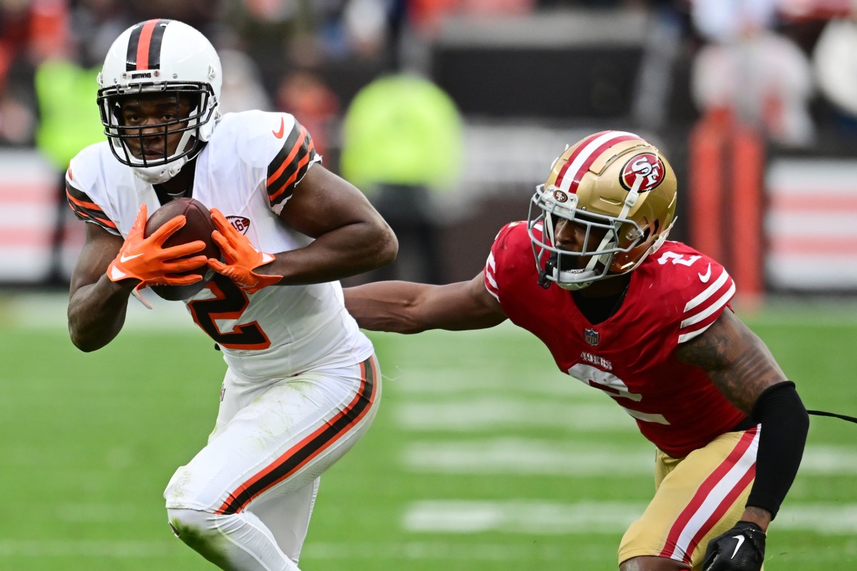 Oct 15, 2023; Cleveland, Ohio, USA; Cleveland Browns wide receiver Amari Cooper (2) runs with the ball after a catch as San Francisco 49ers cornerback Deommodore Lenoir (2) defends during the second half at Cleveland Browns Stadium. Mandatory Credit: Ken Blaze-USA TODAY Sports