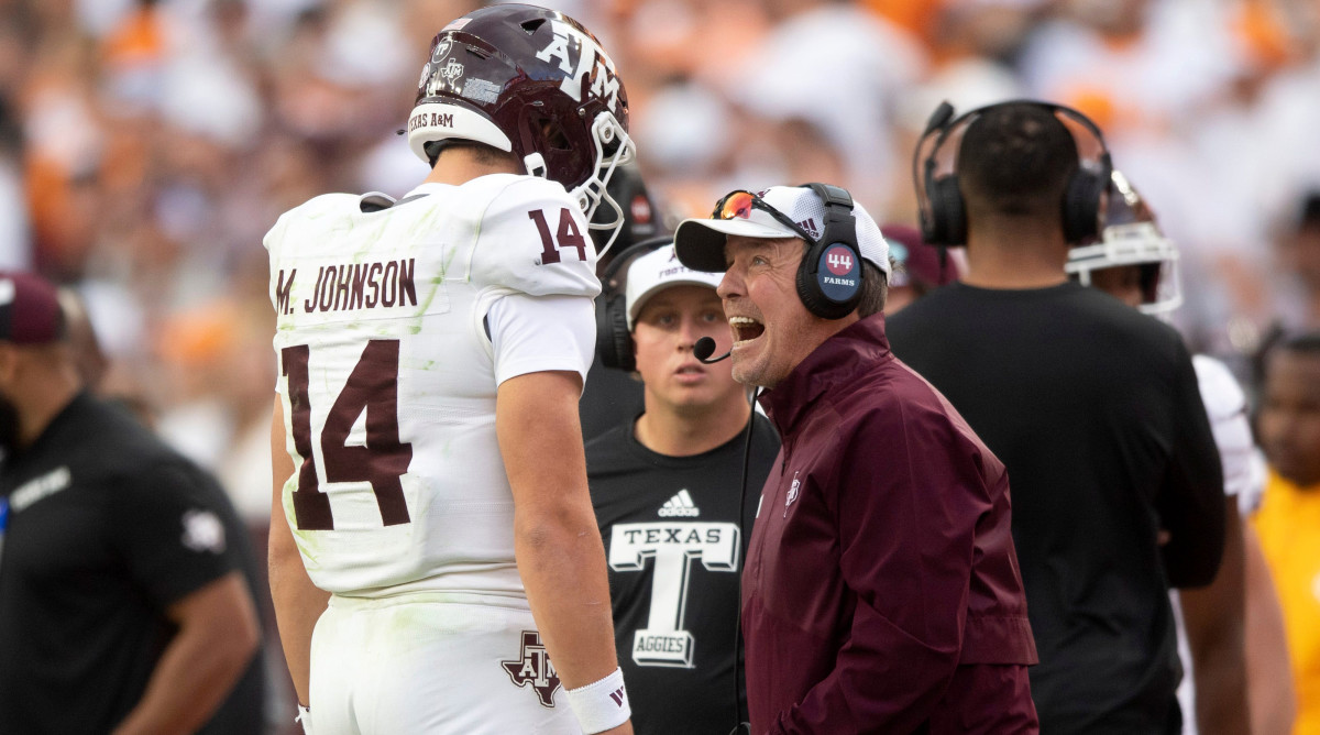 Texas A&M coach Jimbo Fisher yells at quarterback Max Johnson in the Aggies’ game against Tennessee.