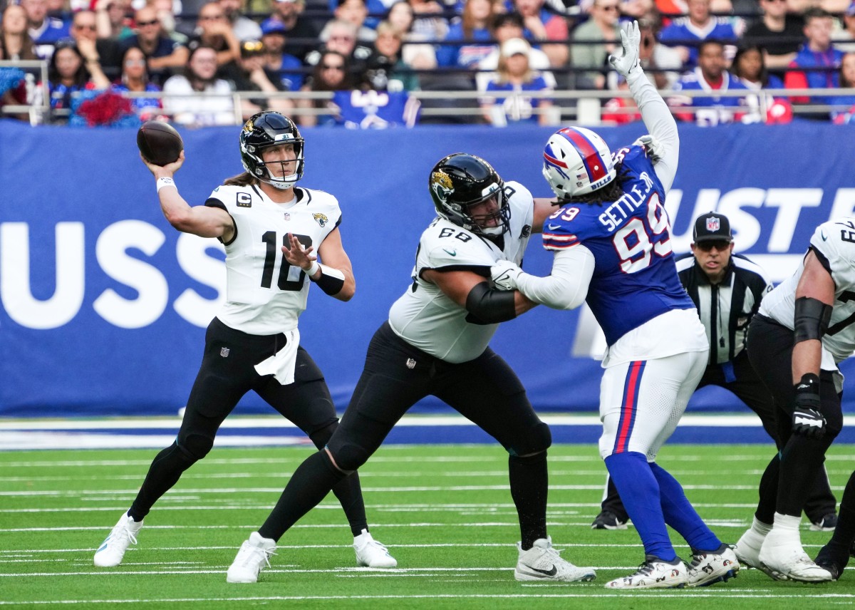 Oct 8, 2023; Jacksonville Jaguars quarterback Trevor Lawrence (16) throws the ball against the Buffalo Bills. Mandatory Credit: Kirby Lee-USA TODAY Sports