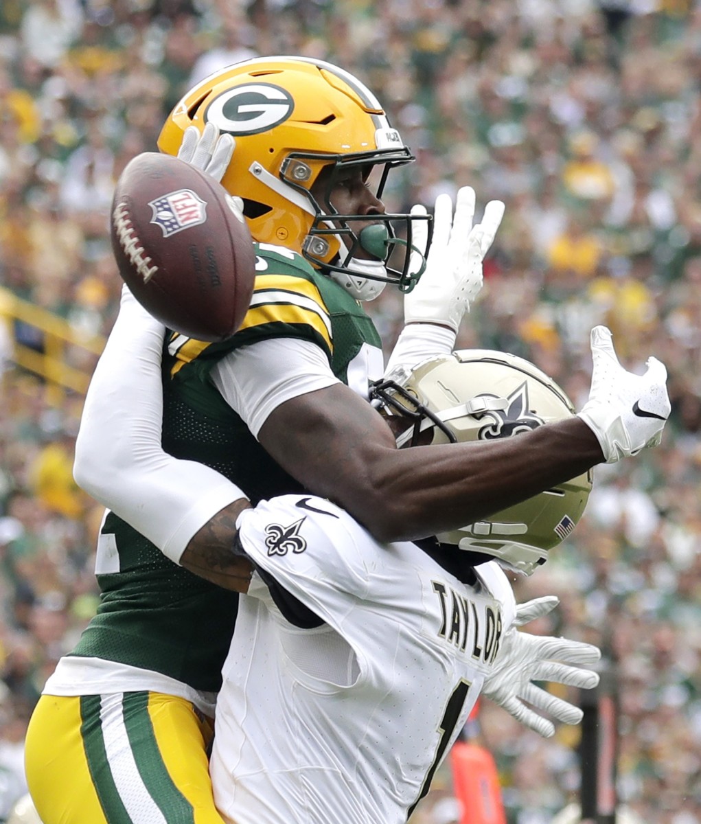 Sep 24, 2023; New Orleans Saints cornerback Alontae Taylor (1) breaks up a pass to Green Bay Packers receiver Romeo Doubs (87). Mandatory Credit: Wm. Glasheen-USA TODAY Sports