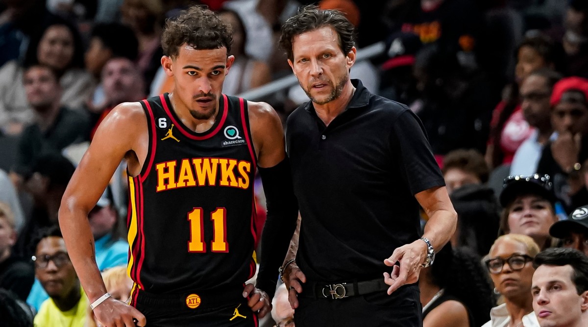Hawks point guard Trae Young speaks with Hawks point guard Trae Young.