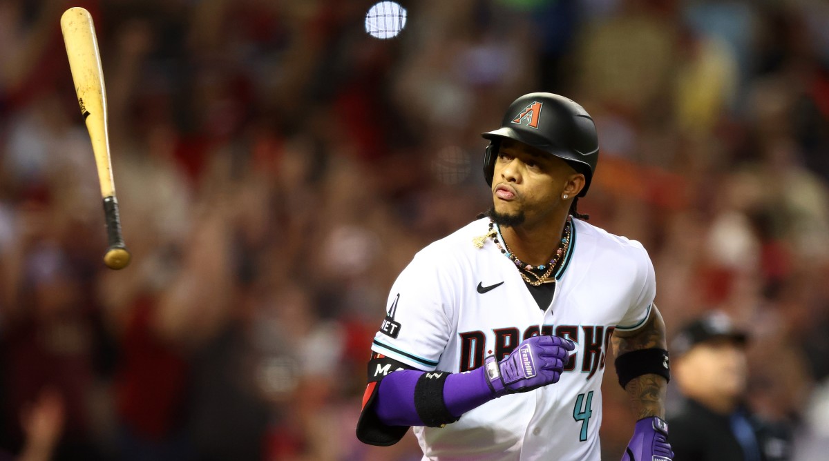 Diamondbacks second baseman Ketel Marte (4) reacts after hitting a home run against the Dodgers.