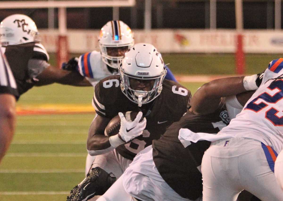 Darrion Dupree, a running back from Mount Carmel High School in Chicago, carries the ball during the team's season-opening win over East St. Louis at Hancock Stadium in Normal, Ill. on Saturday Aug. 26, 2023.