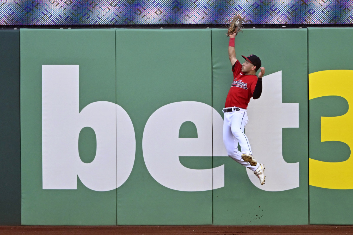 Sep 2, 2023; Cleveland, Ohio, USA; Cleveland Guardians left fielder Steven Kwan (38) makes a leaping catch against the Tampa Bay Rays in the second inning at Progressive Field.
