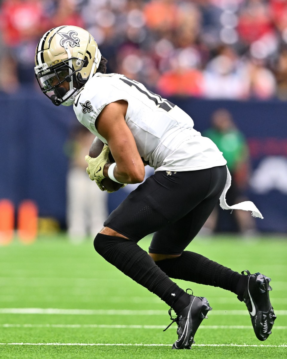 Oct 15, 2023; New Orleans Saints receiver Chris Olave (12) catches a pass against the Houston Texans. Mandatory Credit: Maria Lysaker-USA TODAY Sports