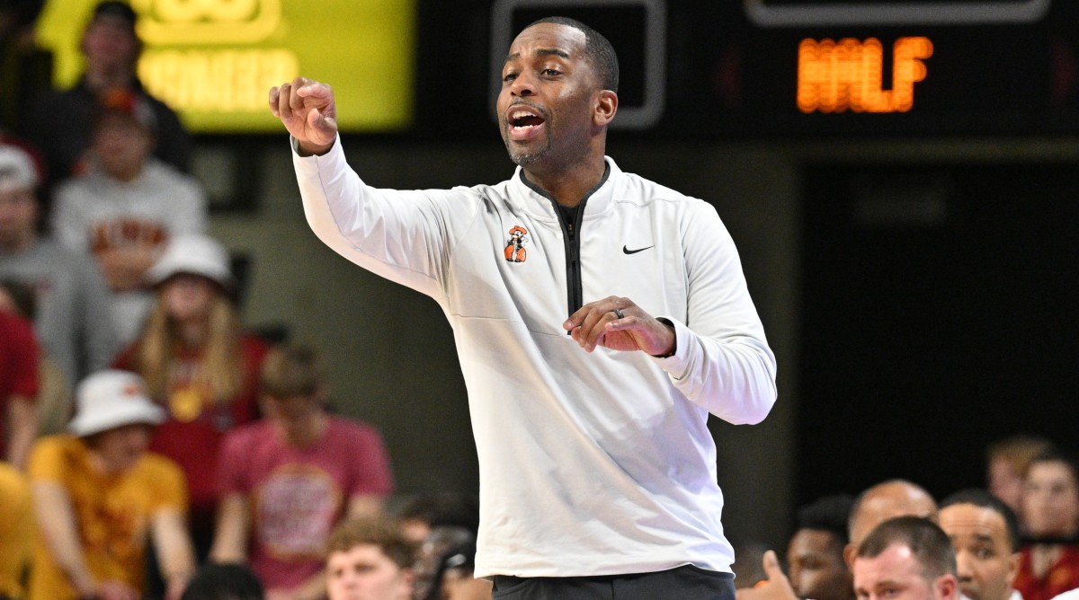 Oklahoma State basketball coach Mike Boynton Jr. reacts during the first half of a game against Iowa State.