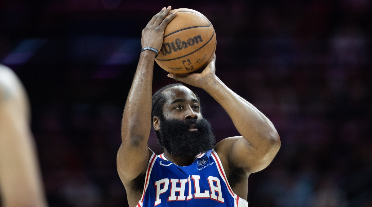 76ers guard James Harden (1) shoots against the Celtics during a game.