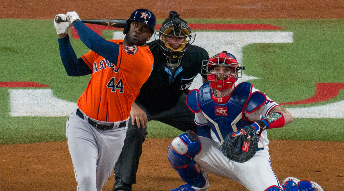 Astros’ Yordan Alvarez drives in a run vs. the Rangers in ALCS Game 4.