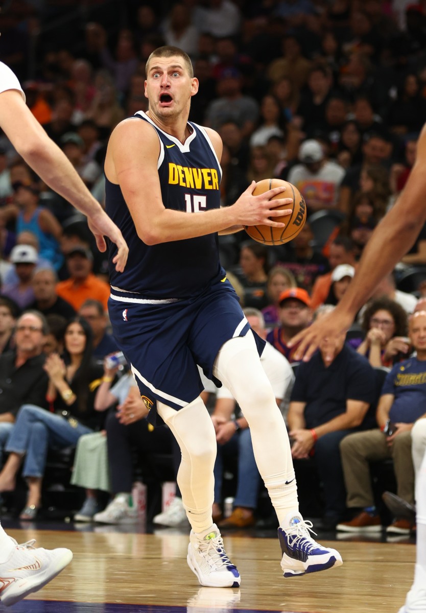 Denver Nuggets center Nikola Jokic drives against the Phoenix Suns