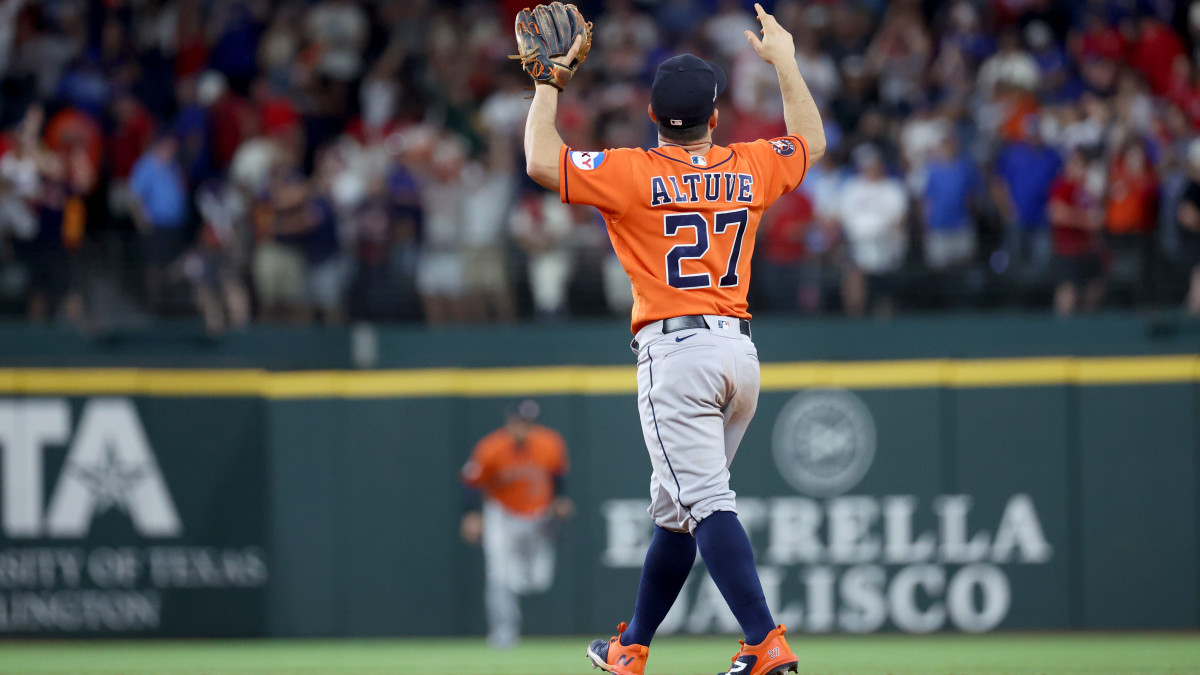 Houston Astros second baseman Jose Altuve celebrates after the Astros defeated the Texas Rangers during game five in the ALCS.