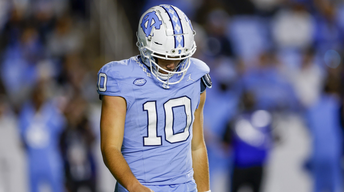 UNC quarterback Drake Maye hangs his head during loss to Virginia