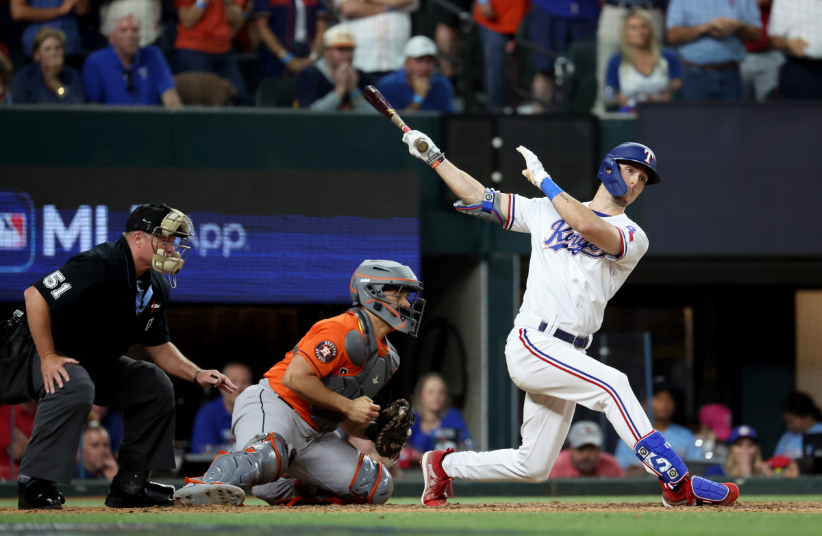 Oct 20, 2023; Arlington, Texas, USA; Texas Rangers center fielder Evan Carter (32) strikes out to end game five in the ALCS against the Houston Astros for the 2023 MLB playoffs at Globe Life Field. Mandatory Credit: Kevin Jairaj-USA TODAY Sports