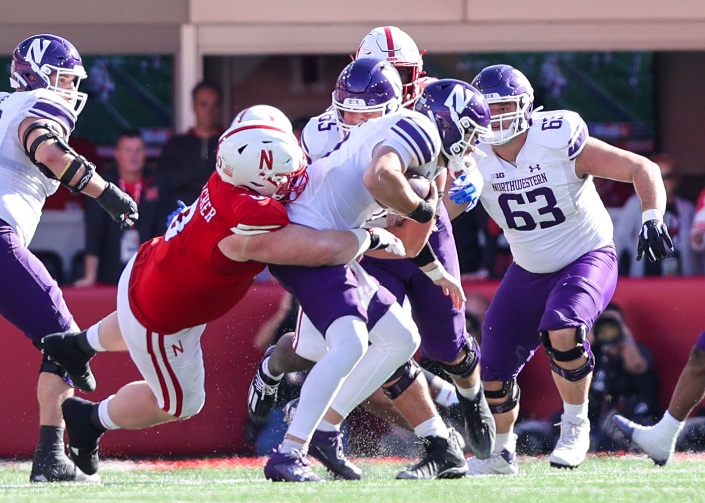 Nebraska defensive tackle Nash Hutmacher earns a tackle for loss during the 17-9 win over Northwestern (Oct. 21, 2023)