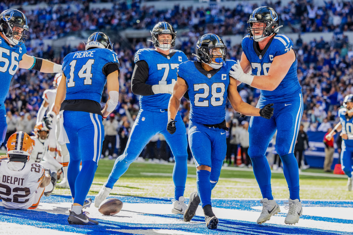 Oct 22, 2023; Indianapolis, Indiana, USA; Indianapolis Colts running back Jonathan Taylor (28) celebrates his touchdown with teammates in the second half against the Cleveland Browns at Lucas Oil Stadium.