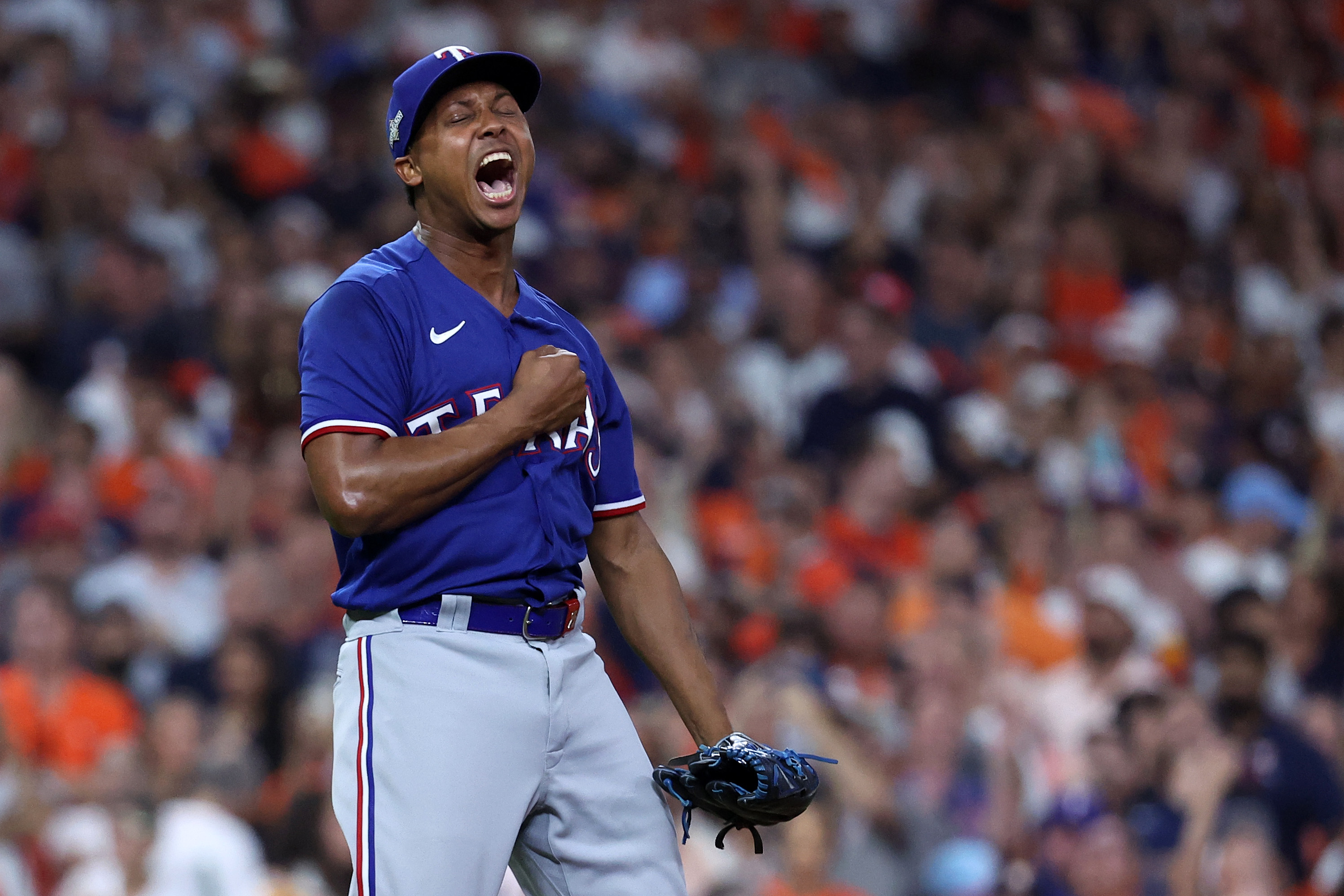 Oct 22, 2023; Houston, Texas, USA; Texas Rangers relief pitcher Jose Leclerc (25) reacts after an out against the Houston Astros in the eighth inning during game six of the ALCS for the 2023 MLB playoffs at Minute Maid Park. Mandatory Credit: Troy Taormina-USA TODAY Sports