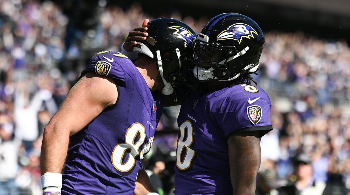 Lamar Jackson and Mark Andrews celebrate after a touchdown against the Lions