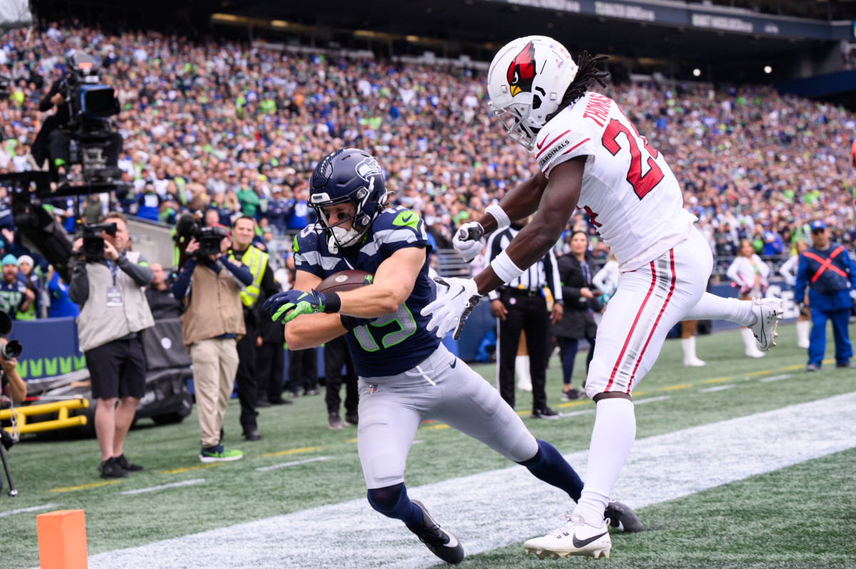 Seattle Seahawks wide receiver Jake Bobo (19) catches a pass for a touchdown over Arizona Cardinals cornerback Starling Thomas V (24) during the first half at Lumen Field.