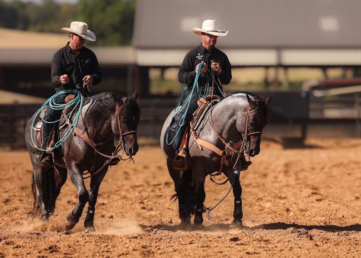 Trevor Brazile riding The Darkk Side and Miles Baker riding Pride And Joyy
