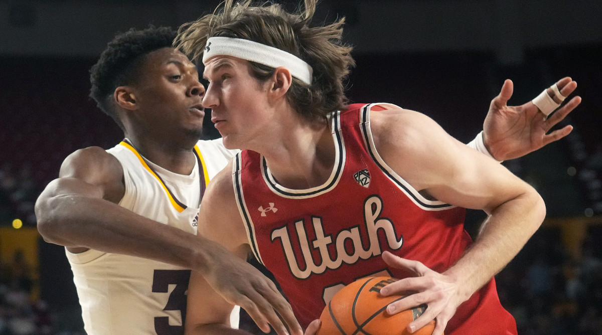 ASU Sun Devils forward Alonzo Gaffney defends Utah Utes center Branden Carlson.