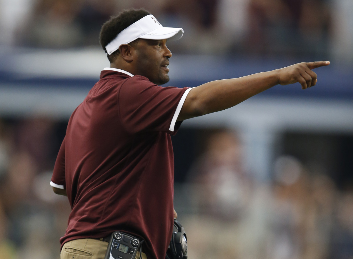 Texas A&M Aggies head coach Kevin Sumlin on the sidelines against the Arkansas Razorbacks at AT&T Stadium.