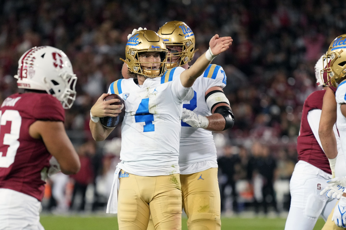 Oct 21, 2023; Stanford, California, USA; UCLA Bruins quarterback Ethan Garbers (4) gestures after rushing for a first down against the Stanford Cardinal during the second quarter at Stanford Stadium. Mandatory Credit: Darren Yamashita-USA TODAY Sports