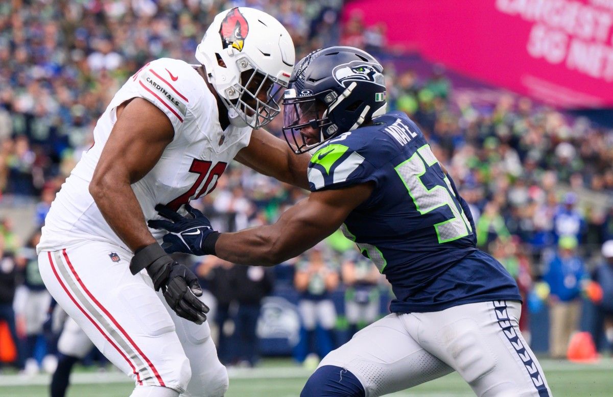 Arizona Cardinals offensive tackle Paris Johnson Jr. (70) blocks Seattle Seahawks linebacker Boye Mafe (53) during the second half at Lumen Field.