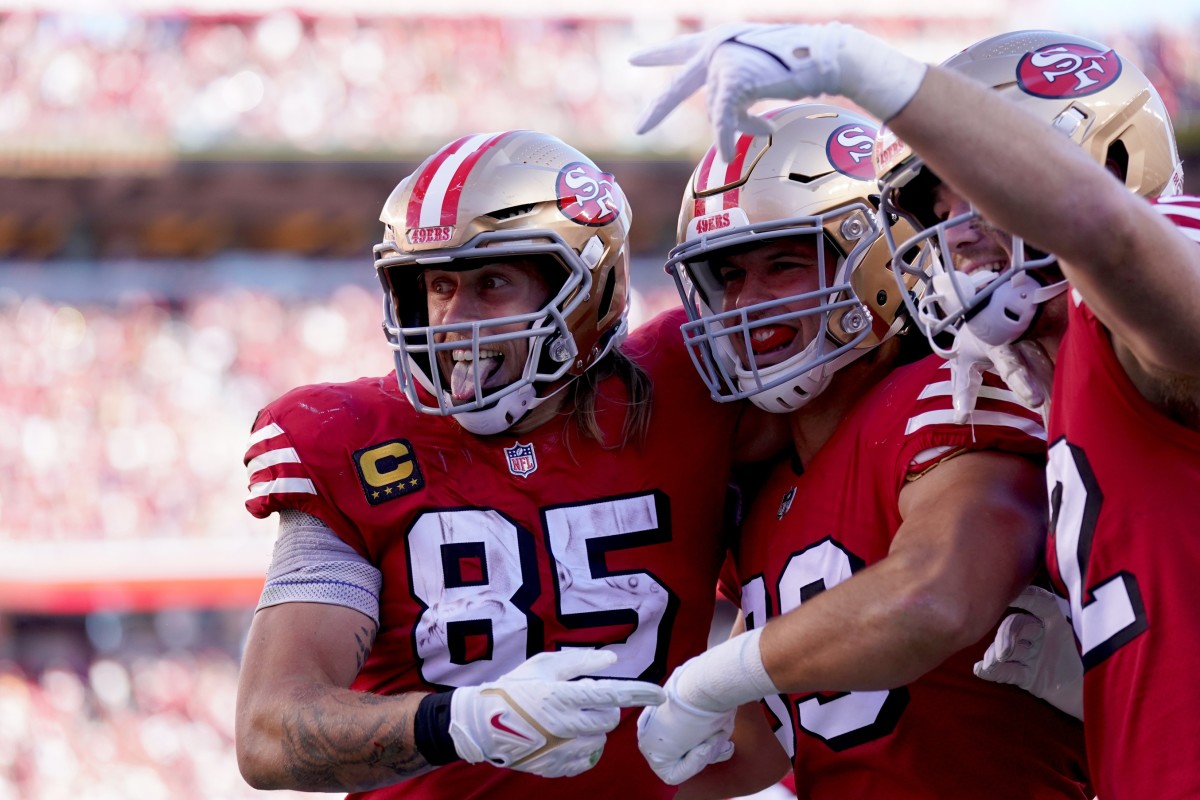 49ers tight ends George Kittle, Charlie Woerner and Ross Dwelley celebrating after Kittle scored a touchdown. Kittle loves National Tight Ends Day, which was Sunday in Week 7.