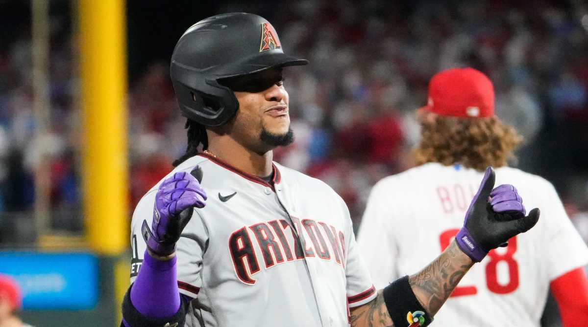 Diamondbacks second baseman Ketel Marte puts up shaka fingers after hitting an RBI triple against the Philadelphia Phillies in Game 6 of the 2023 NLCS