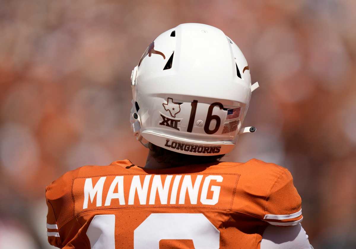 Texas Longhorns quarterback Arch Manning warms up before the game against the Kansas Jayhawks at Royal-Memorial Stadium on Saturday, September 30, 2023
