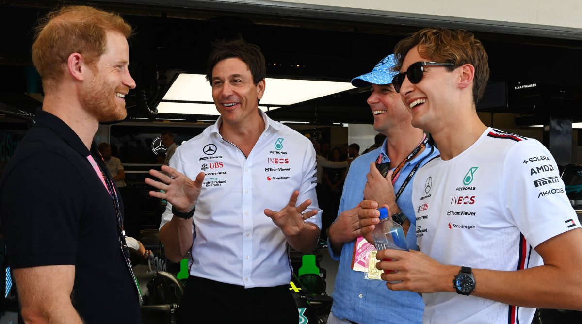 Prince Harry, talks with Toto Wolff, Team Principal and CEO of Mercedes-AMG, and driver George Russell at the U.S. Grand Prix.