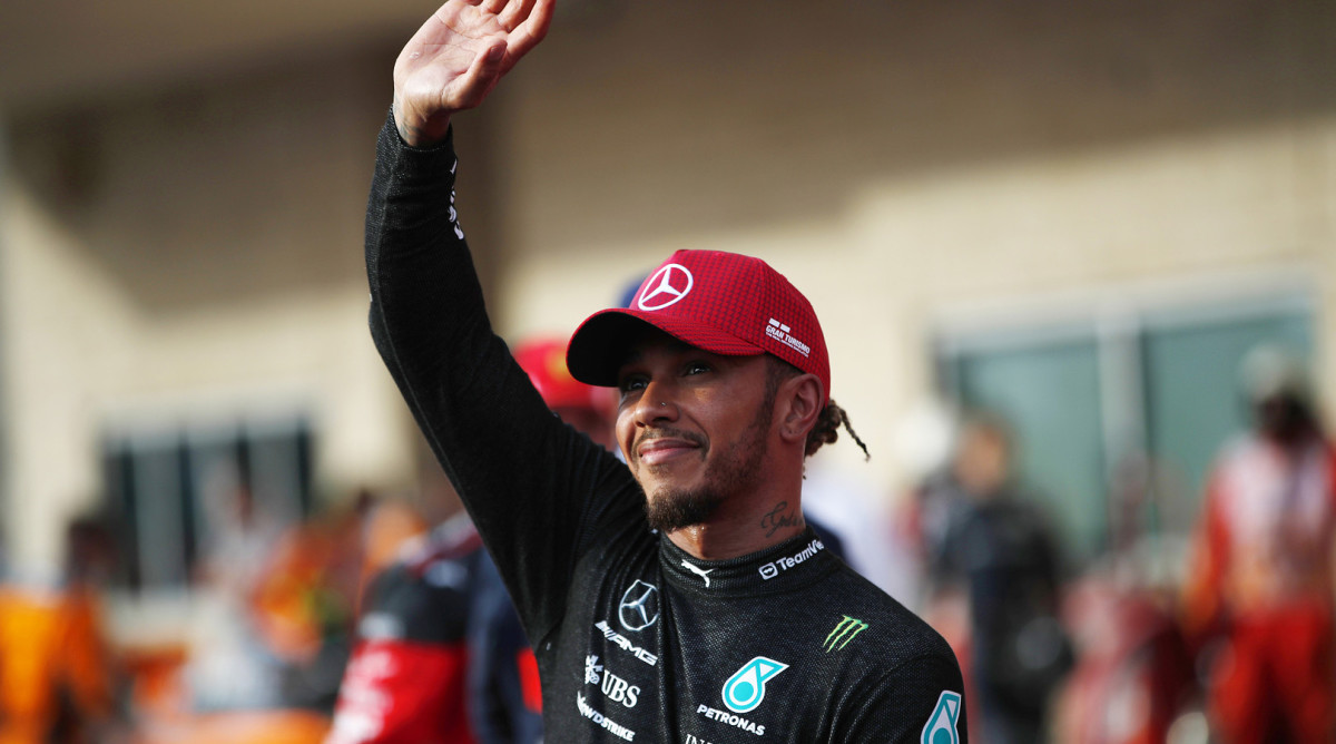 Mercedes driver Lewis Hamilton waves to the crowd at the U.S. Grand Prix.