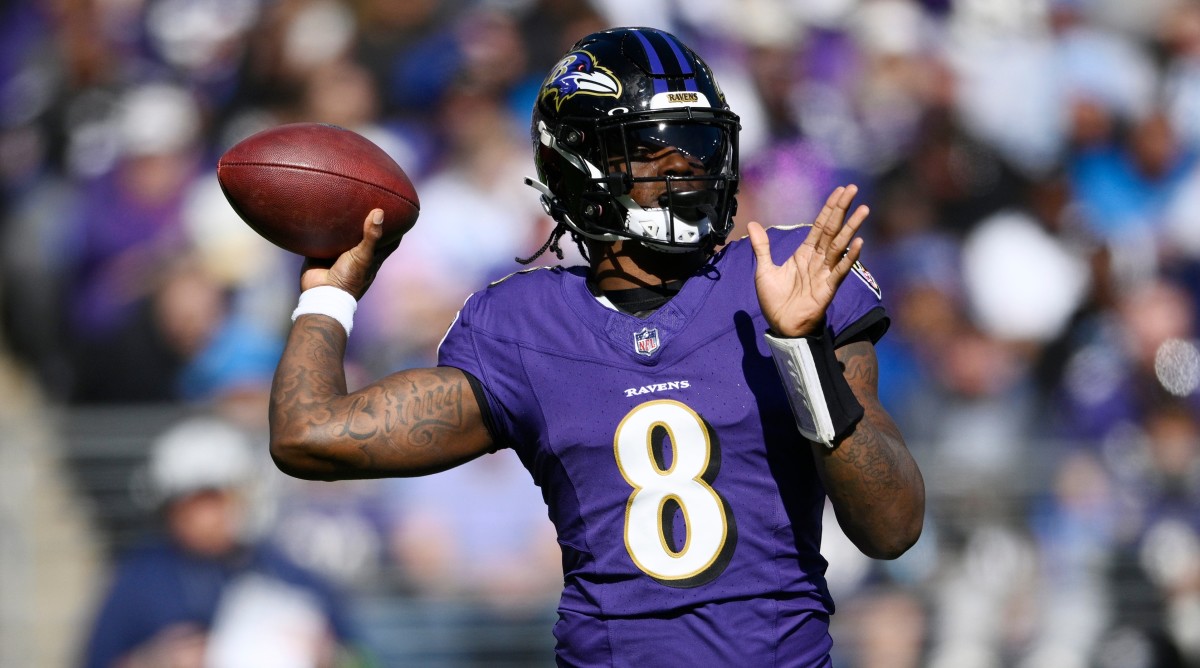 Ravens quarterback Lamar Jackson throws during the first half of a game against the Lions.