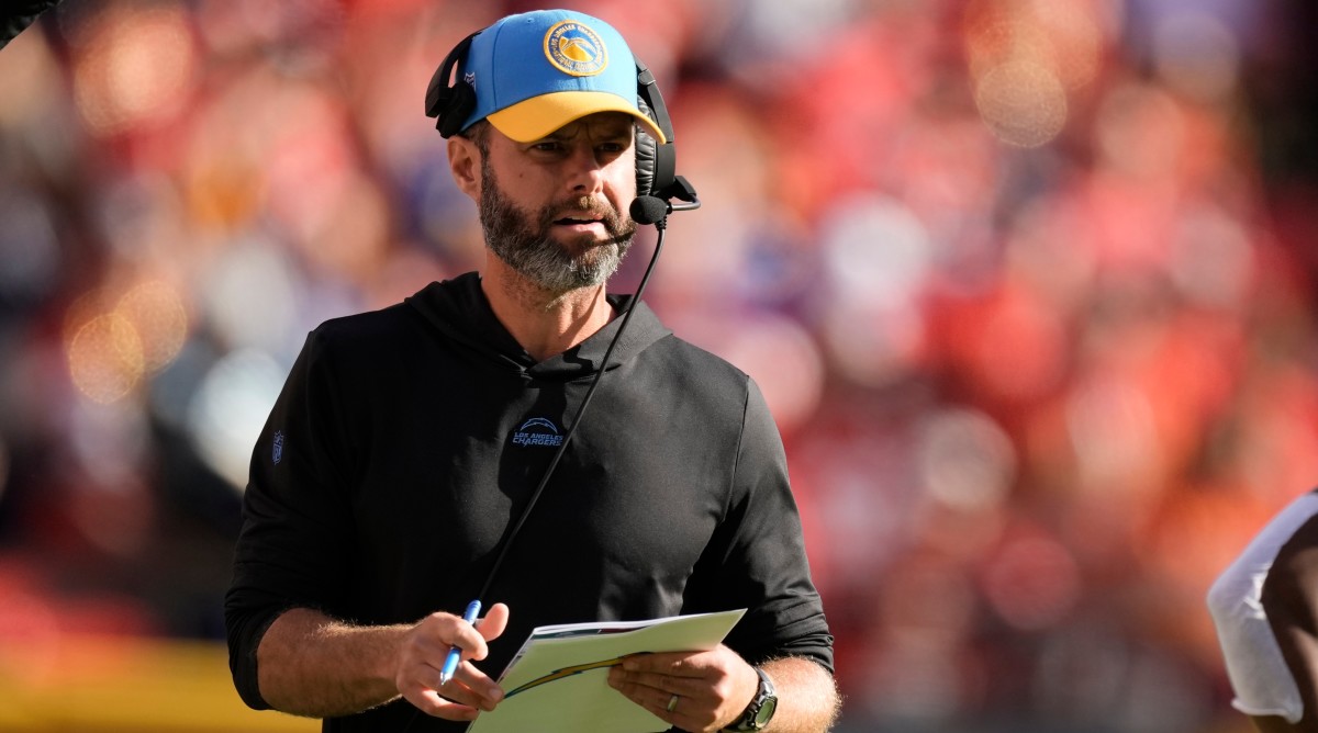 Chargers coach Brandon Staley watches from the sidelines during the first half of a game against the Chiefs.